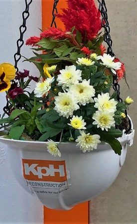 2 Gresham Street – Flowers Planted into Expired Hard Hat – Sustainability – Formatted – Cropped – 1200px